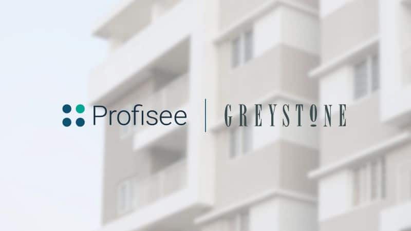 The logos for Profisee and Greystone side by side over a photo of an apartment building.