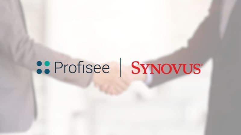 Two business people shaking hands in the background with the Profisee and Synovus logo imposed over their hands.